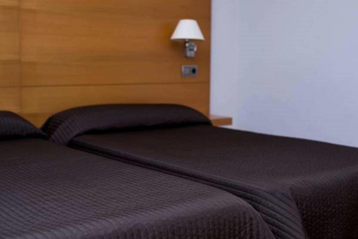 Cama o camas de una habitación en Executive Sport