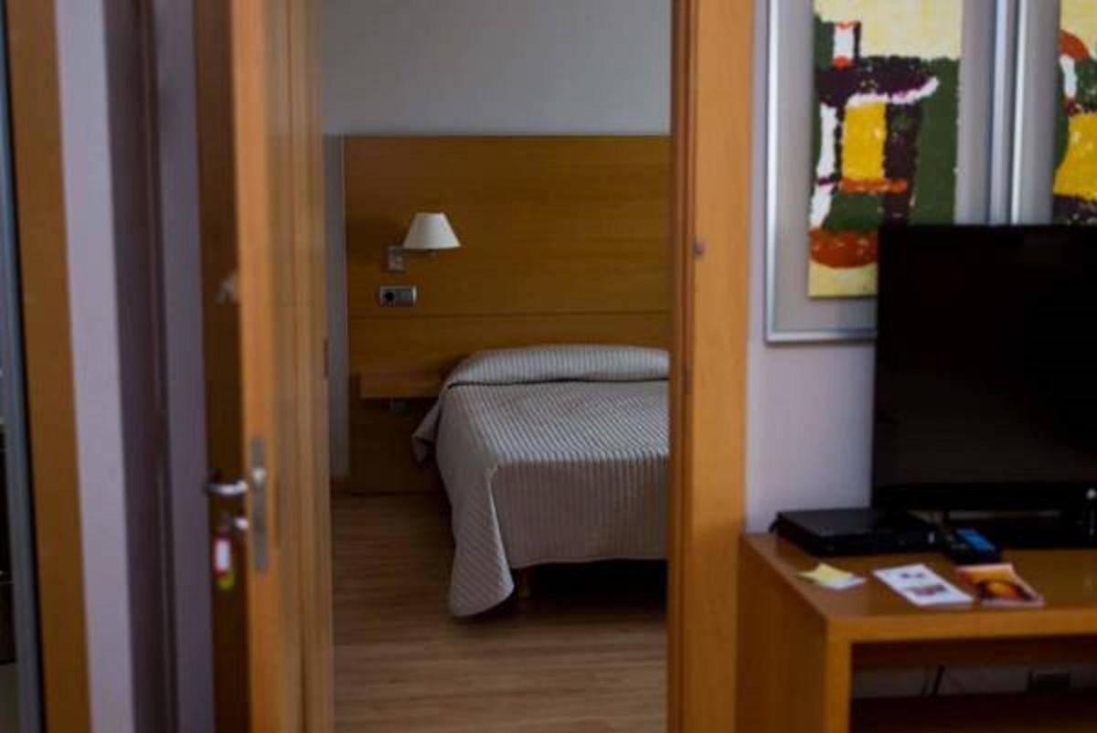 Cama o camas de una habitación en Executive Sport