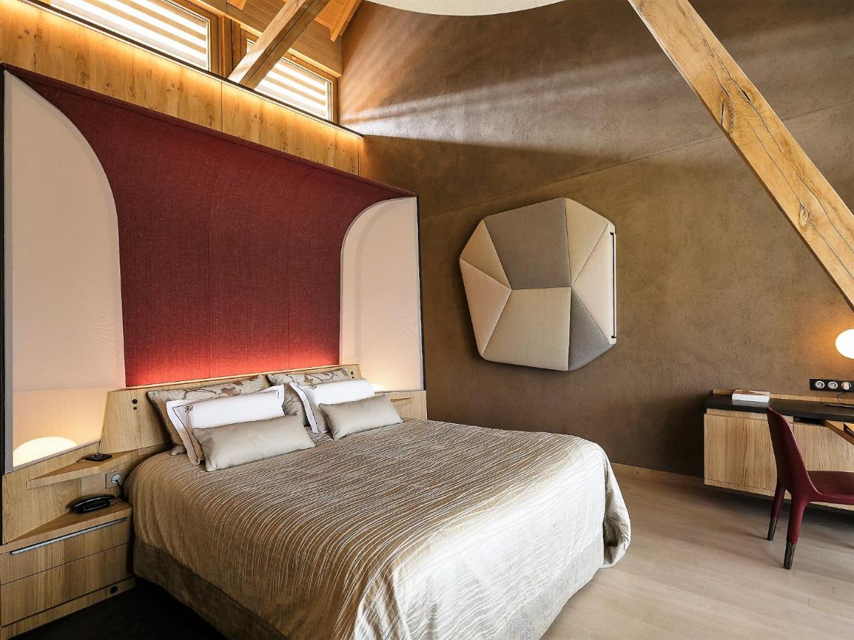 Un ou plusieurs lits dans un hébergement de l'établissement Hotel des Berges, Restaurant Gastronomique & Spa