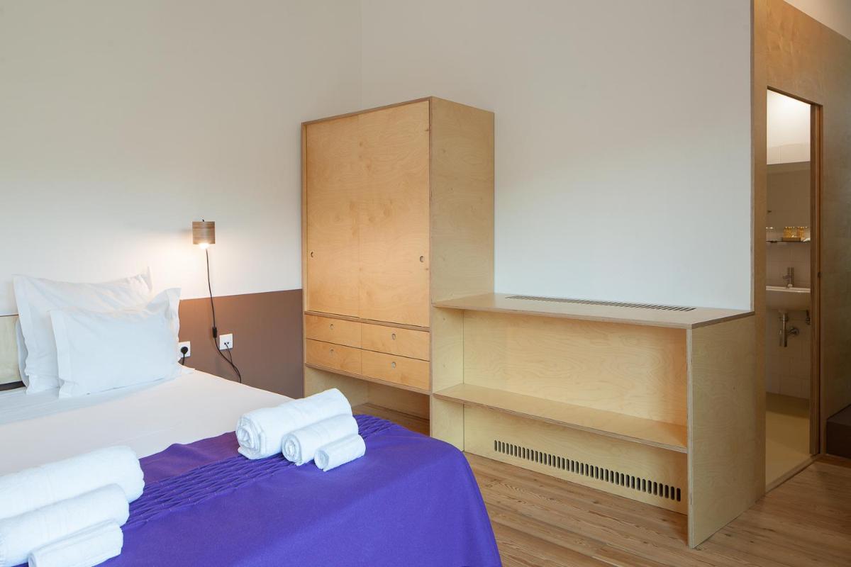 Uma cama ou camas num quarto em Colmeal Countryside Hotel