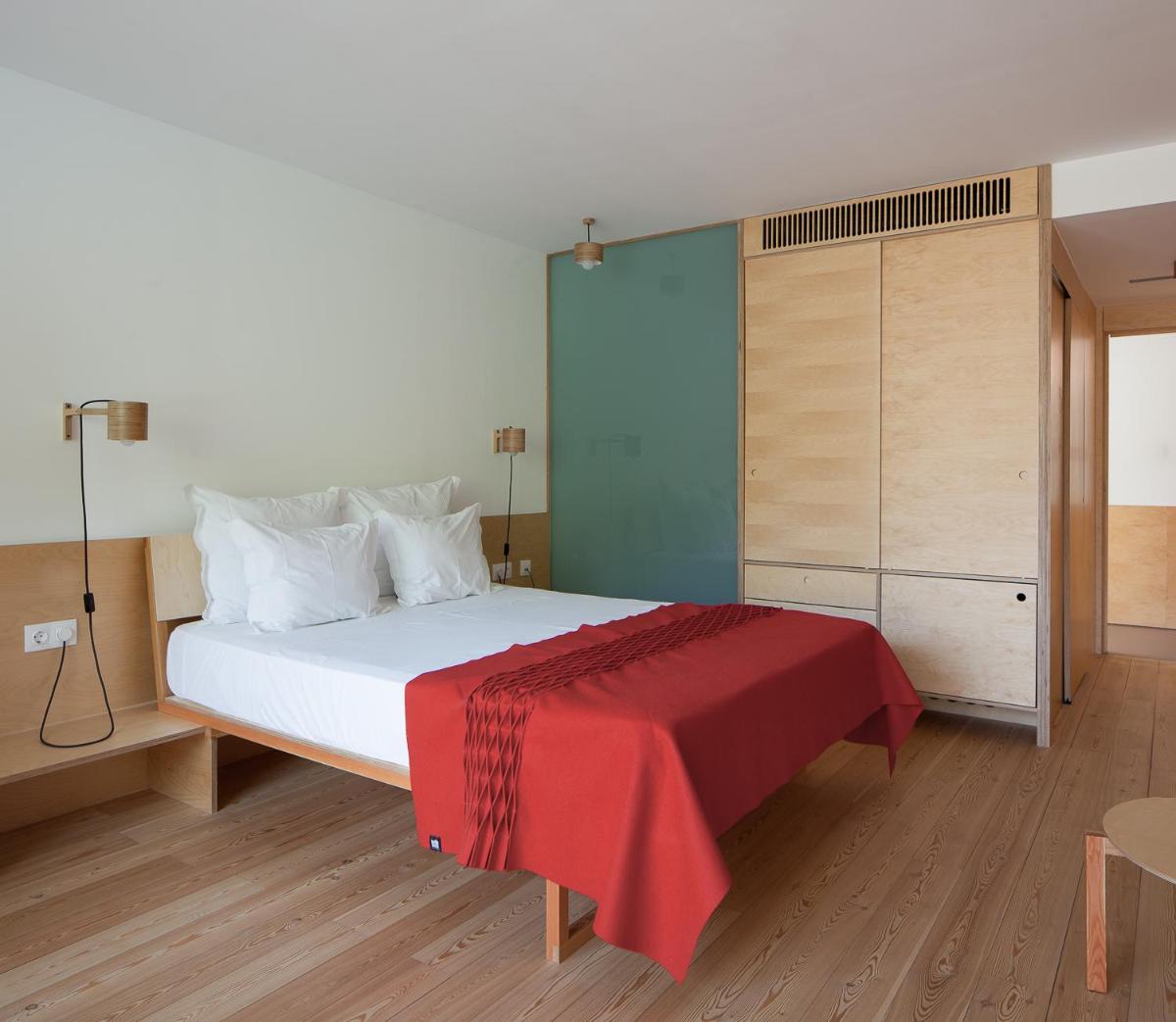 Uma cama ou camas num quarto em Colmeal Countryside Hotel