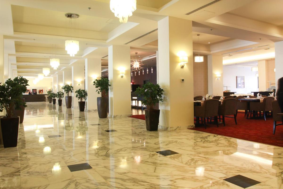 Grand Palace Hotel - Housity