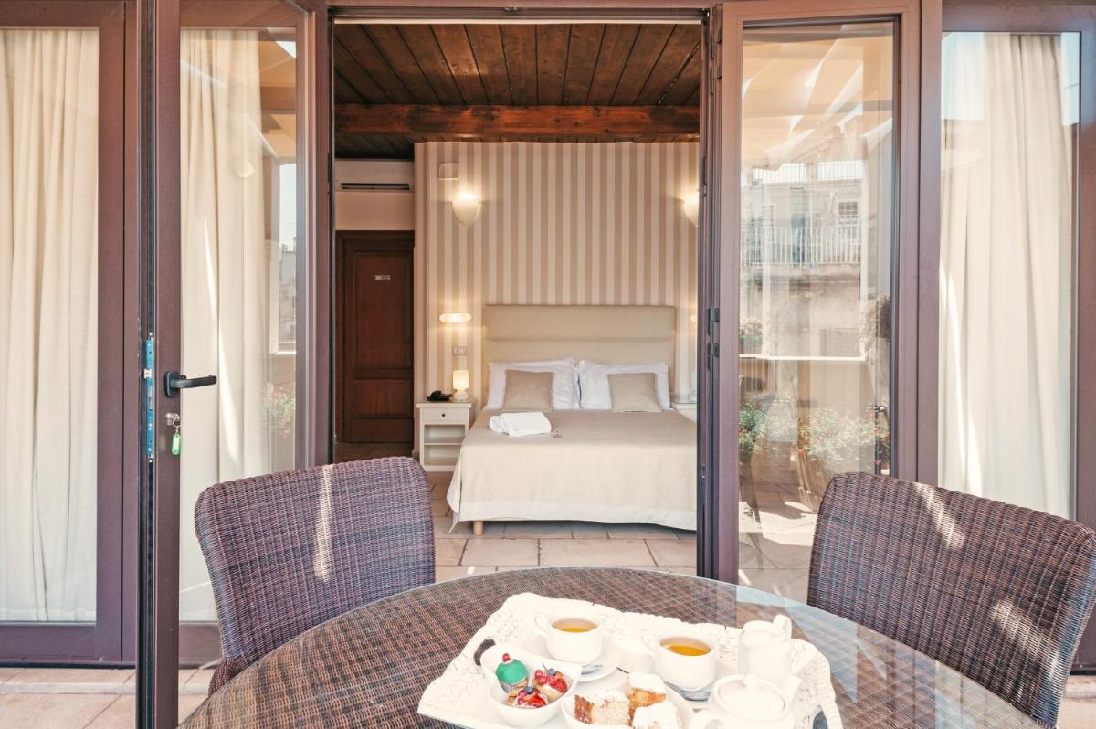 Hotel L'Arcangelo - Boutique Hotel - Housity