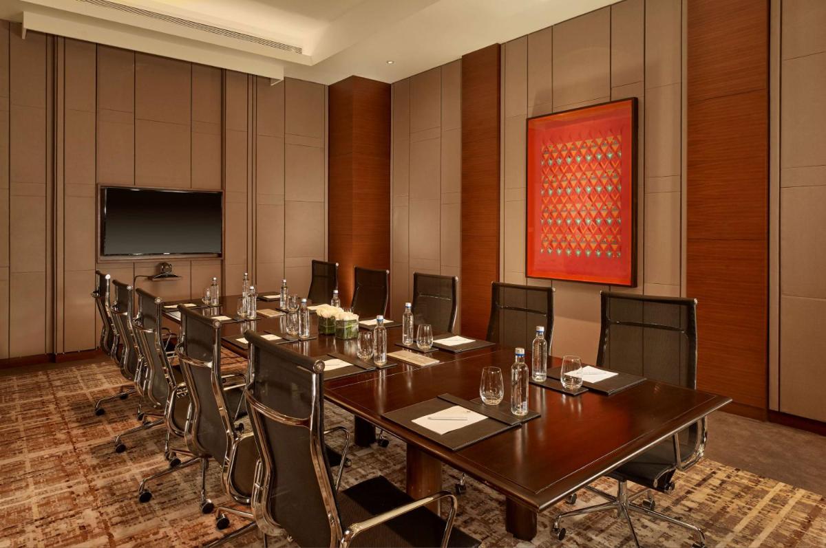 a conference room with a long table and chairs at Hyatt Regency Chandigarh in Chandīgarh