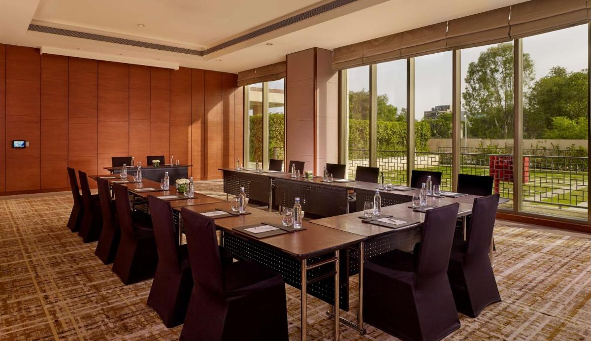 a large conference room with a long table and chairs at Hyatt Regency Chandigarh in Chandīgarh