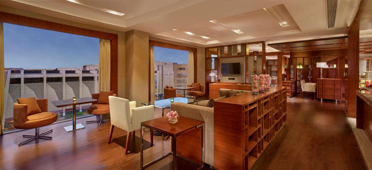 a living room with a view of a building at Hyatt Regency Chandigarh in Chandīgarh