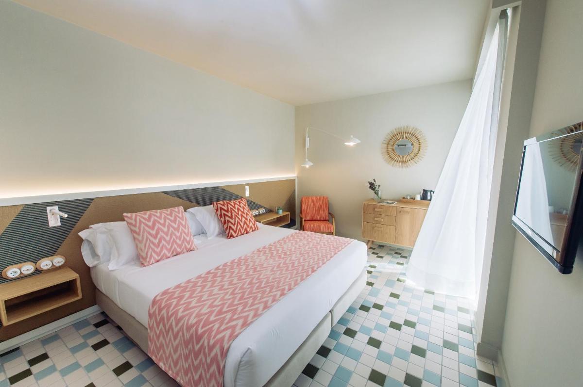 Cama o camas de una habitación en Inturotel Cala Esmeralda Beach Hotel & Spa - Adults Only