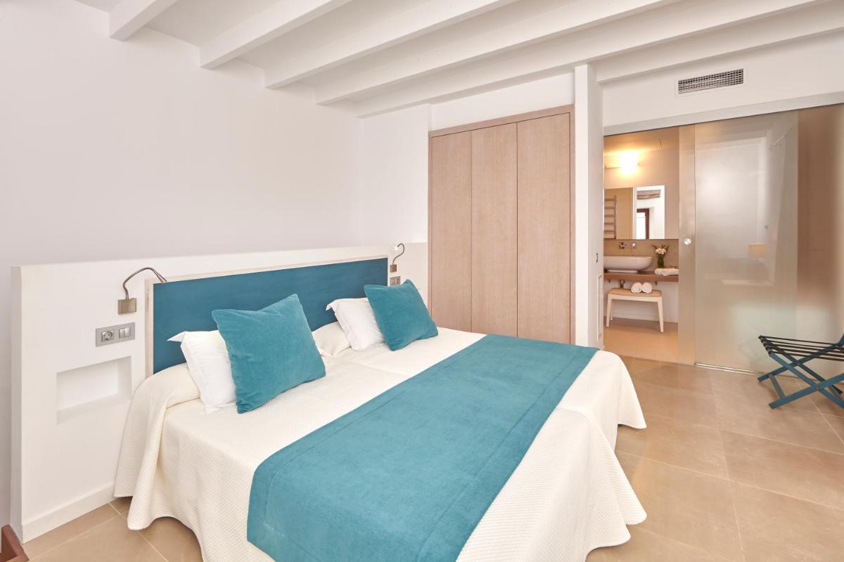 Cama o camas de una habitación en Bennoc Petit Hotel - Only Adults