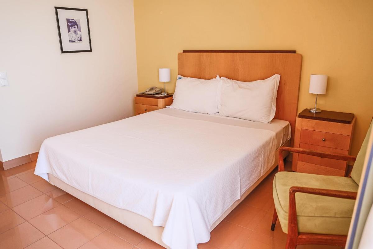 Uma cama ou camas num quarto em Boa Vista Hotel & Spa - Adults Only