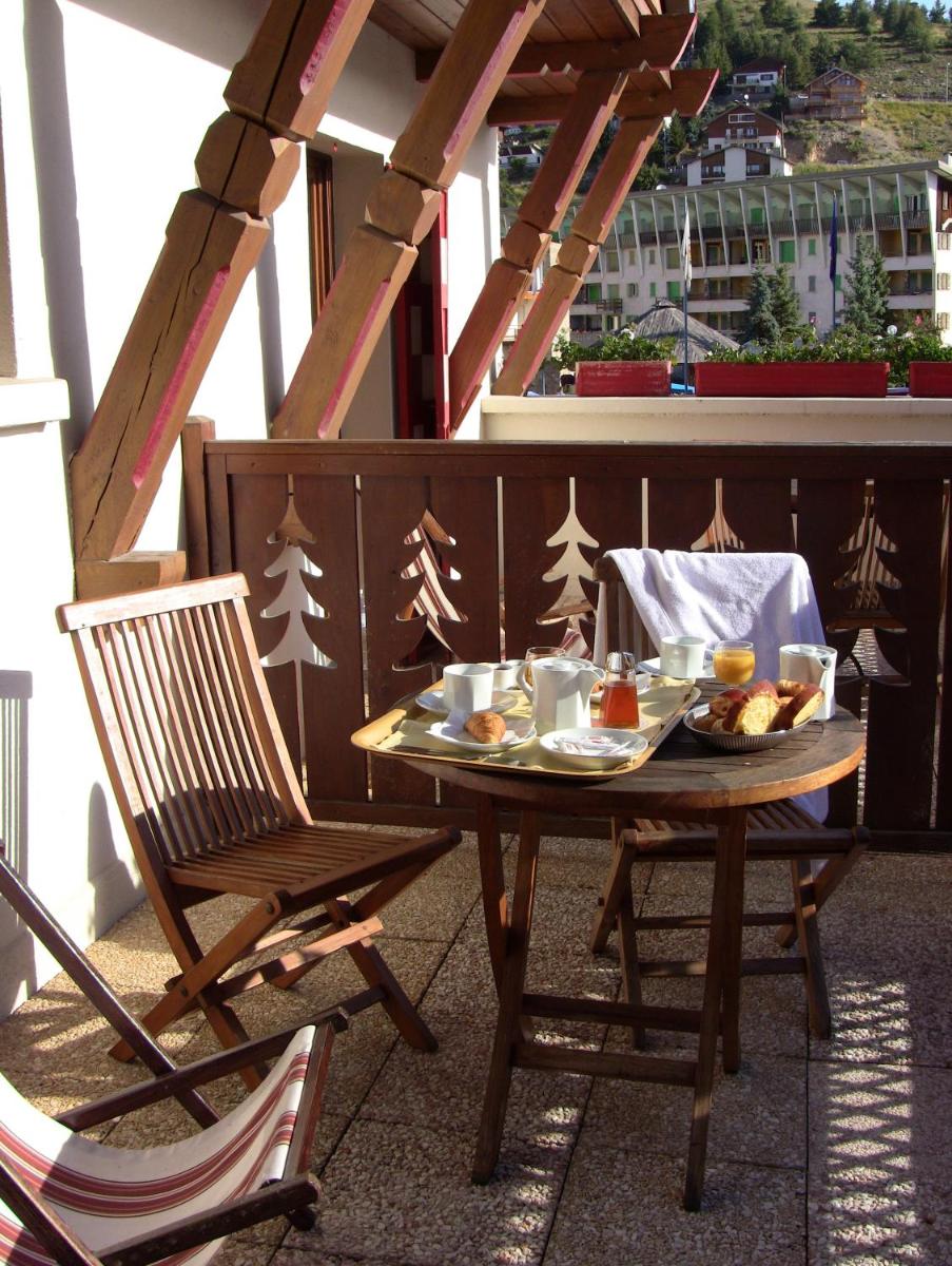 Coin salon dans l'établissement Le Chalet Suisse