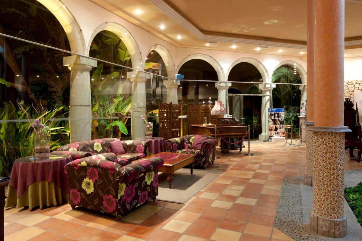 Zona de estar de Lago Garden Apart-Suites & Spa Hotel