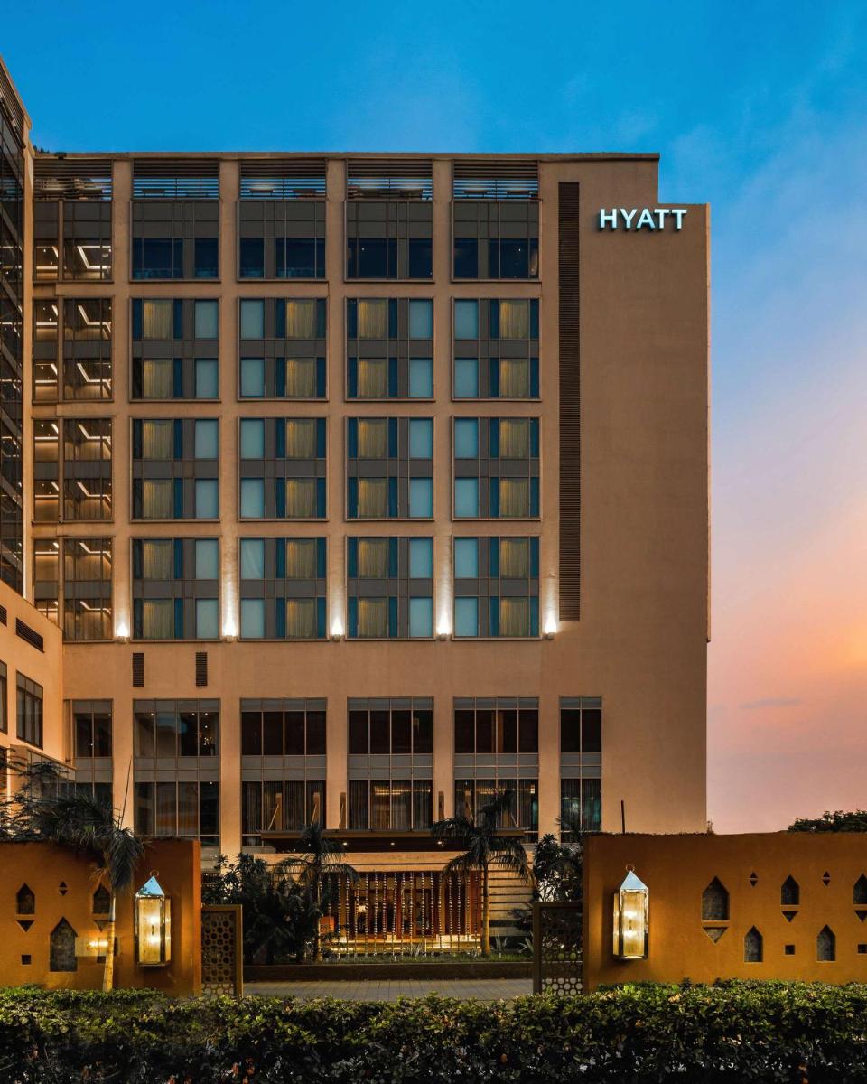 a rendering of the hyatt hotel at dusk at Hyatt Ahmedabad in Ahmedabad