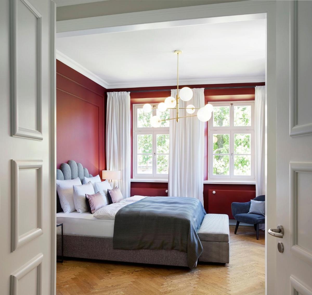 Ein Bett oder Betten in einem Zimmer der Unterkunft Das Tegernsee