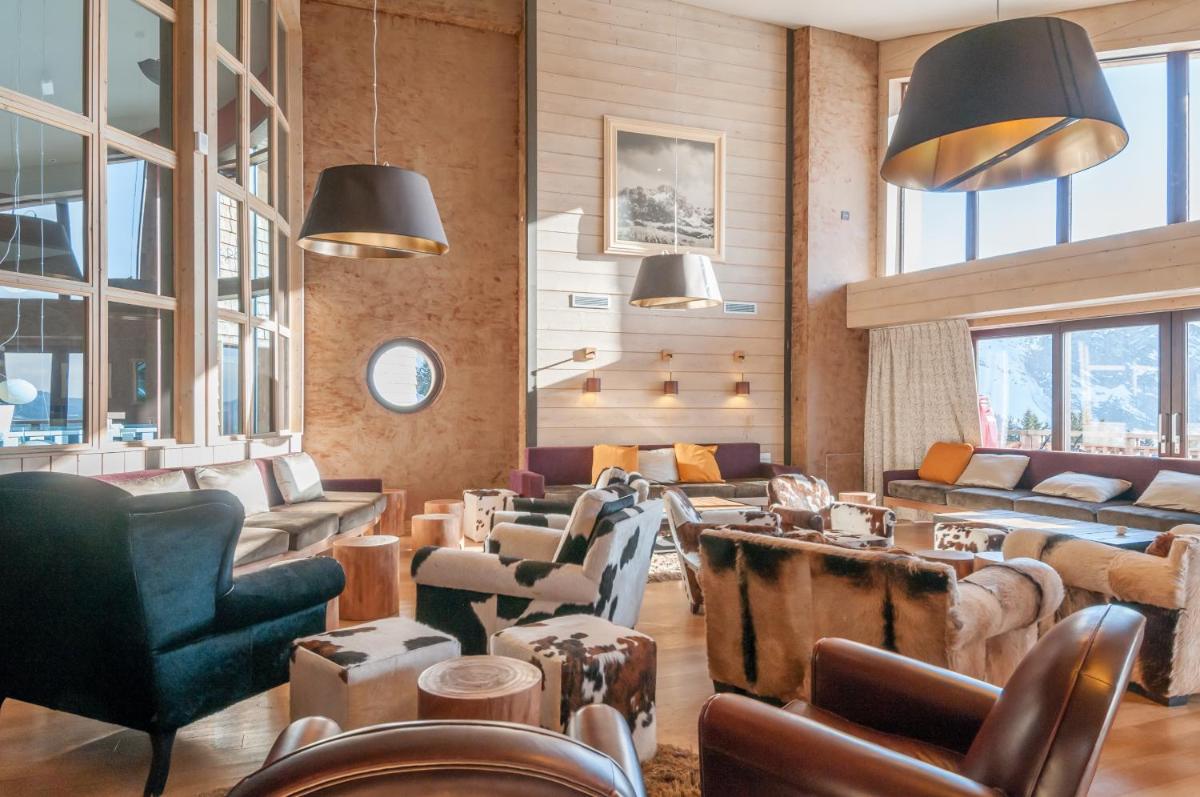 Coin salon dans l'établissement Résidence Pierre & Vacances Premium L'Amara