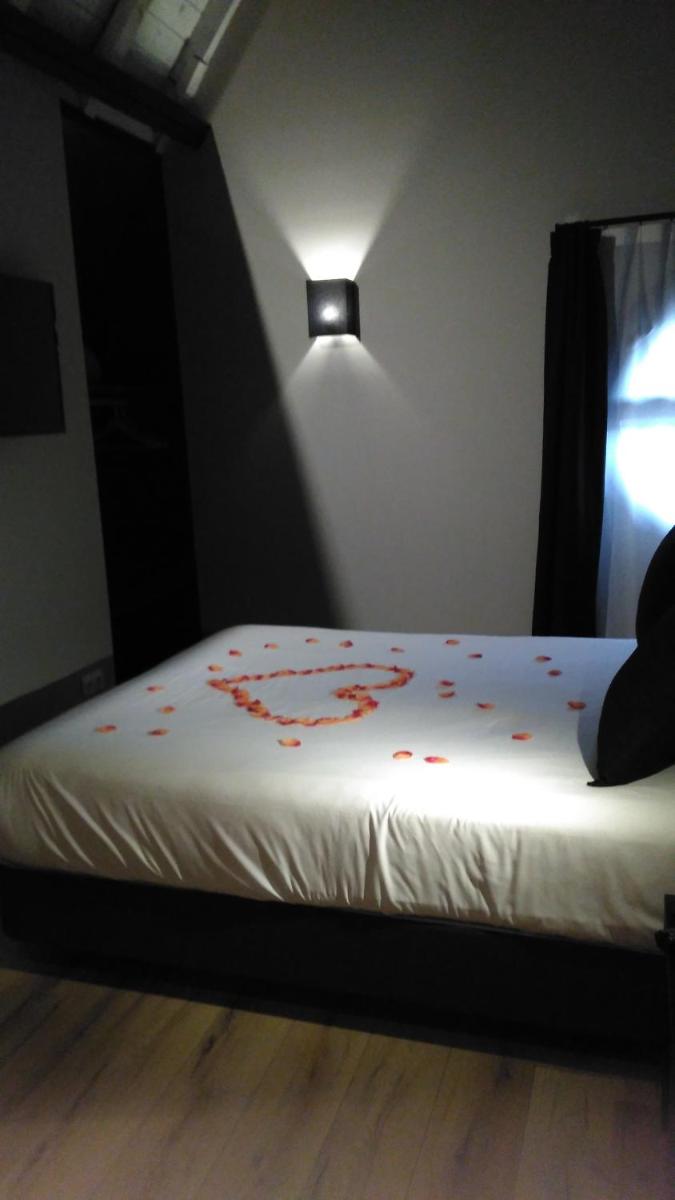 Cama o camas de una habitación en Hotel Parada Puigcerda