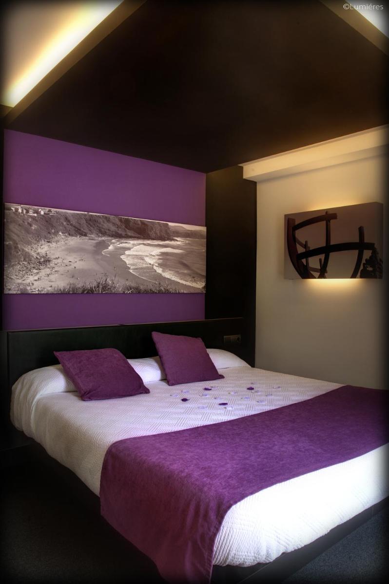Cama o camas de una habitación en Hotel Playa Ribera