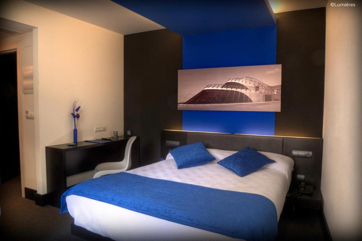 Cama o camas de una habitación en Hotel Playa Ribera