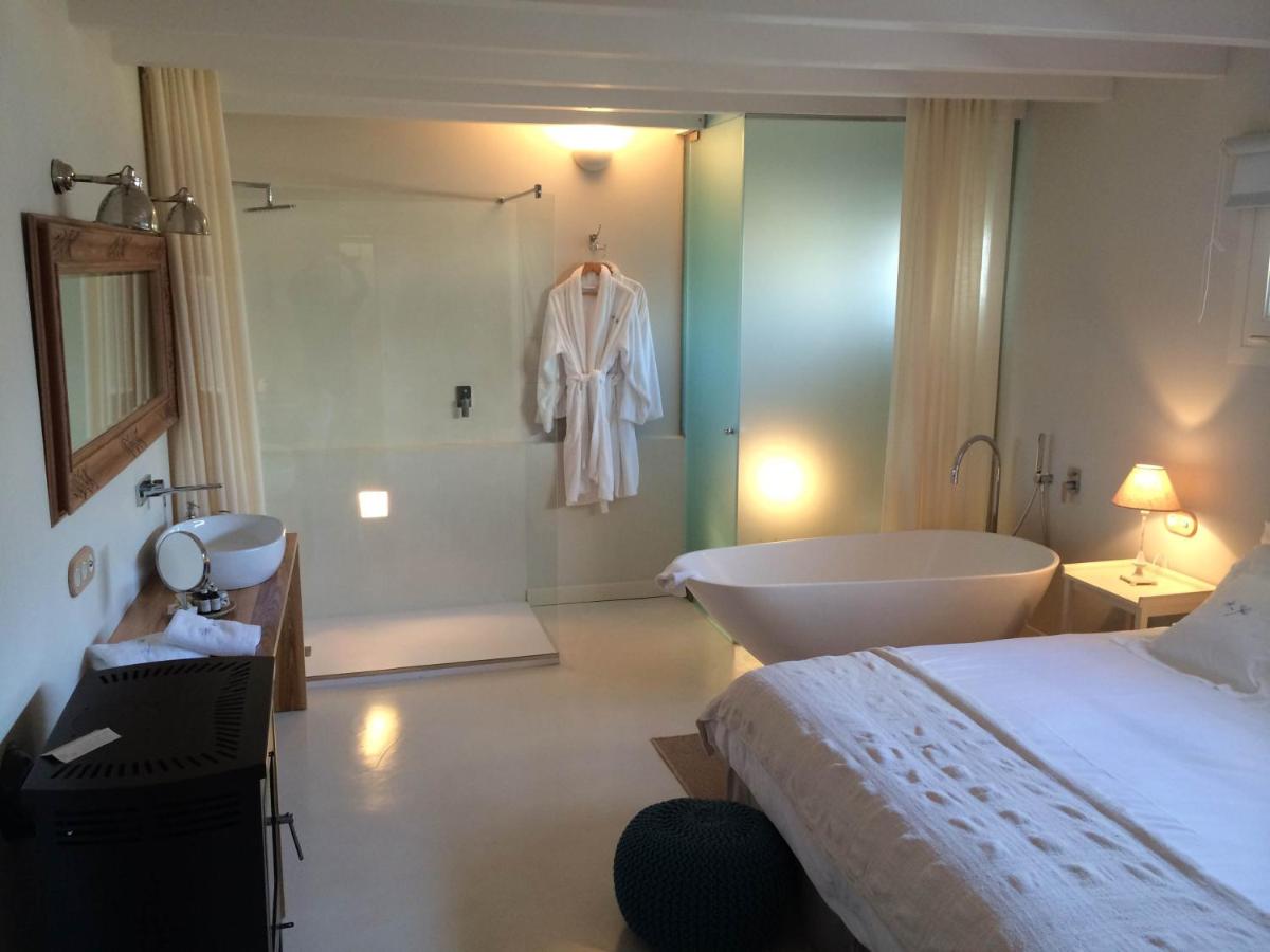 Cama o camas de una habitación en Jardí de Ses Bruixes Boutique Hotel