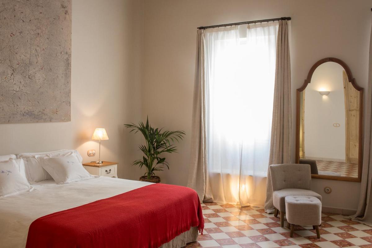 Cama o camas de una habitación en Jardí de Ses Bruixes Boutique Hotel