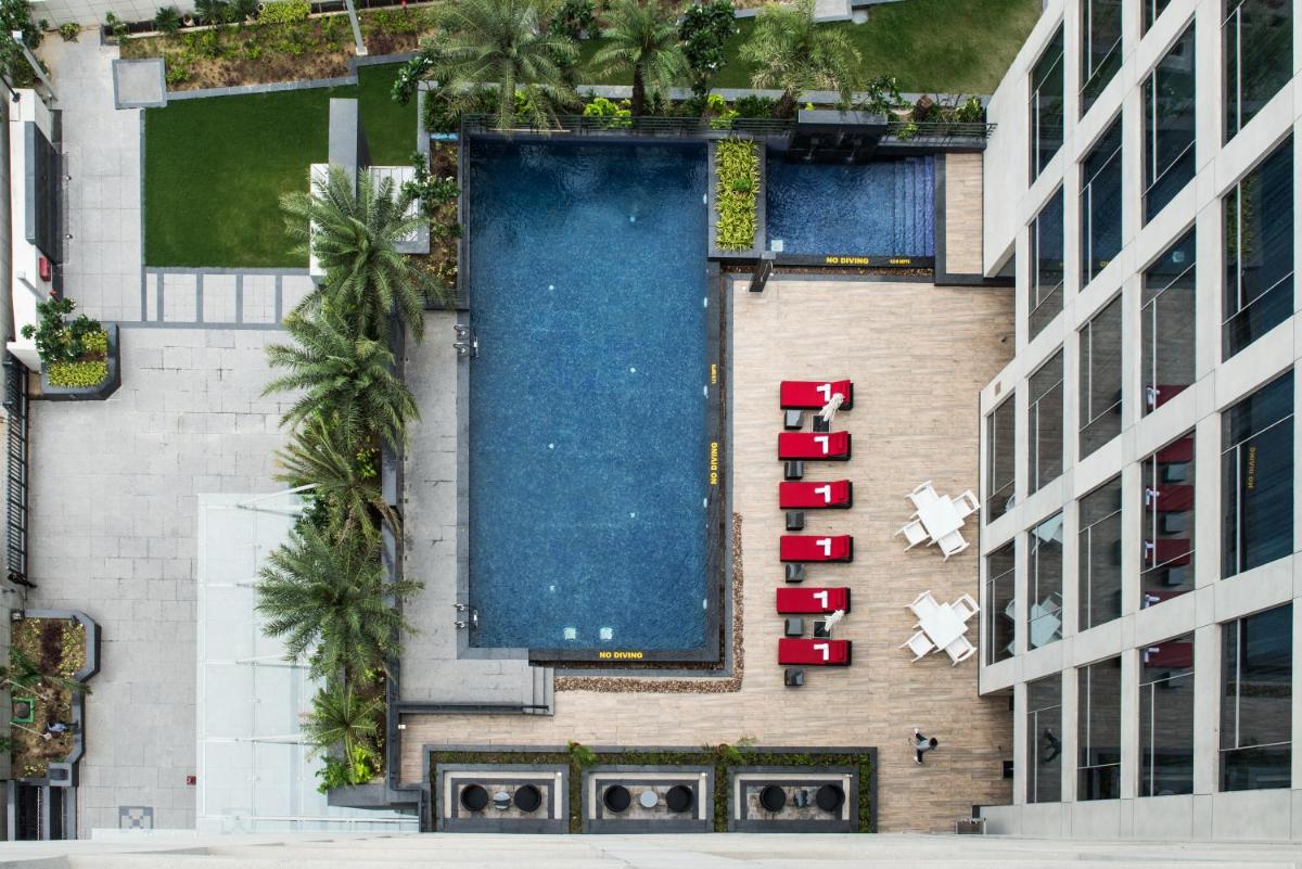 an overhead view of a swimming pool on the side of a building at Hyatt Regency Lucknow Gomti Nagar in Lucknow