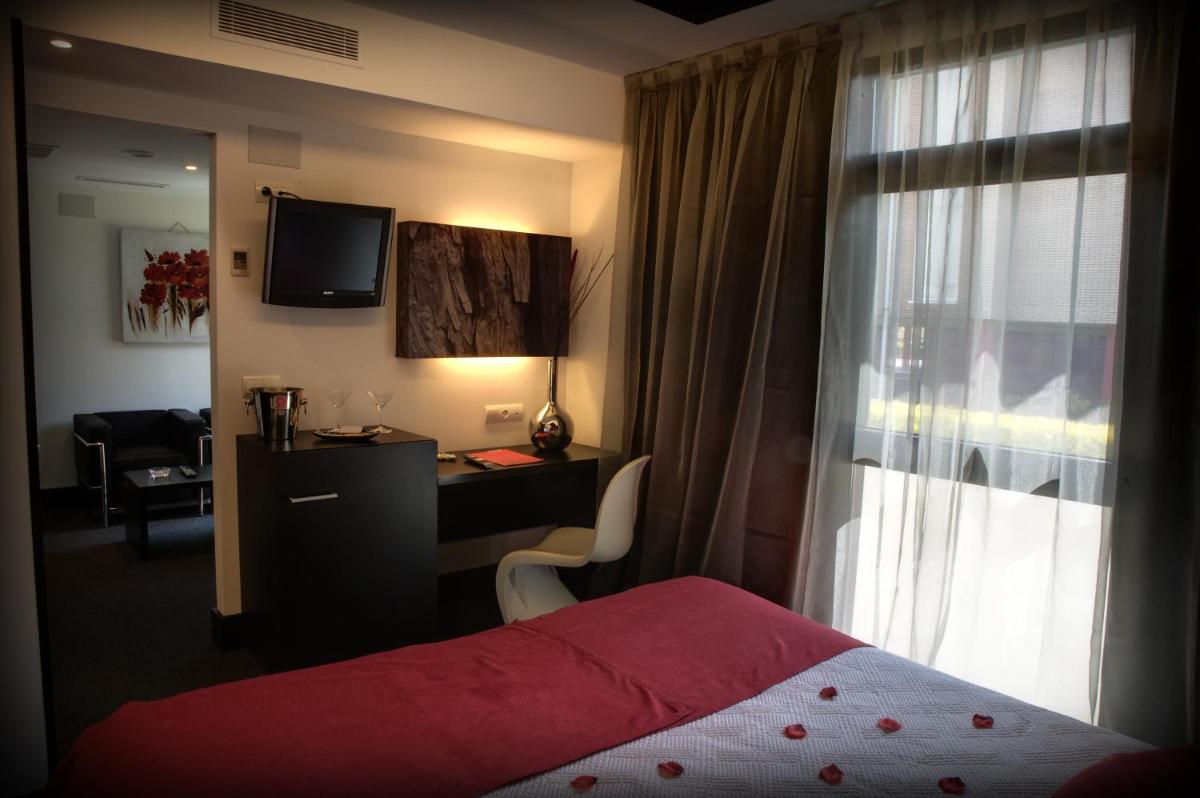 Cama o camas de una habitación en Hotel Playa Ribera