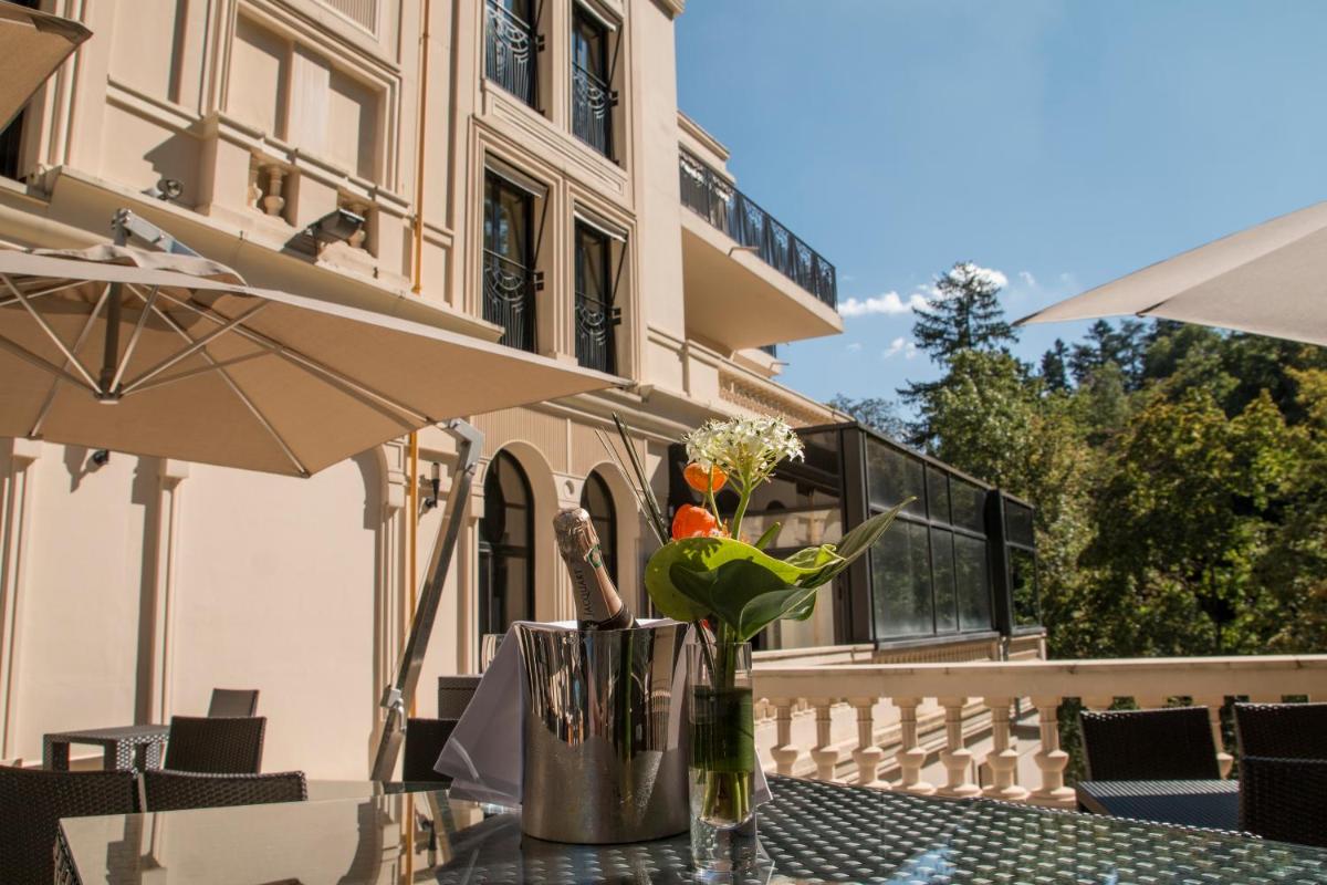 Balcon ou terrasse dans l'établissement Hotel & Spa Le Pavillon