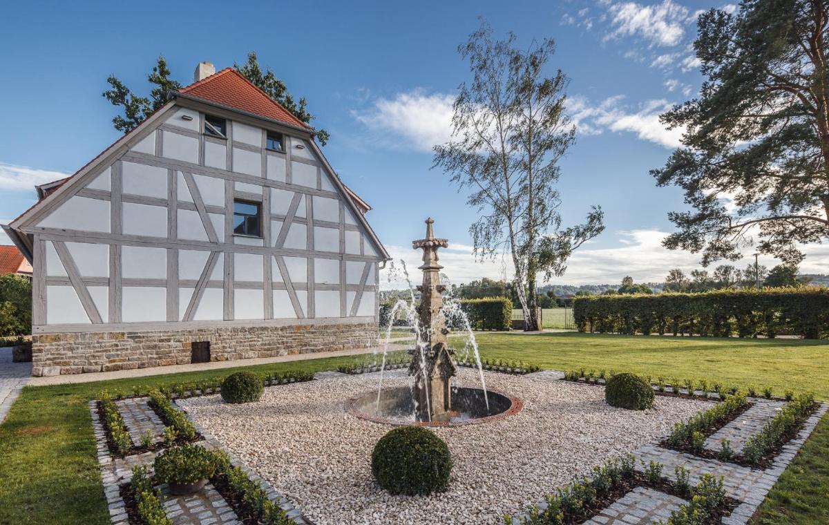 Ein Garten an der Unterkunft Hotel Dorfmühle