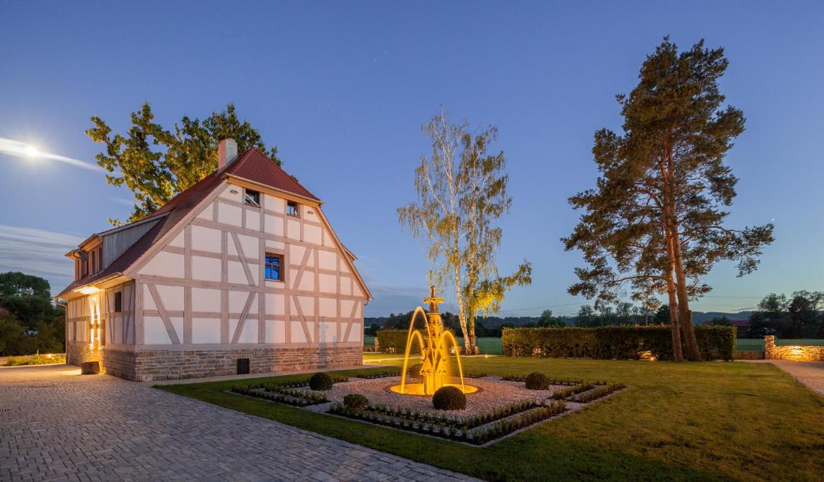 Ein Garten an der Unterkunft Hotel Dorfmühle