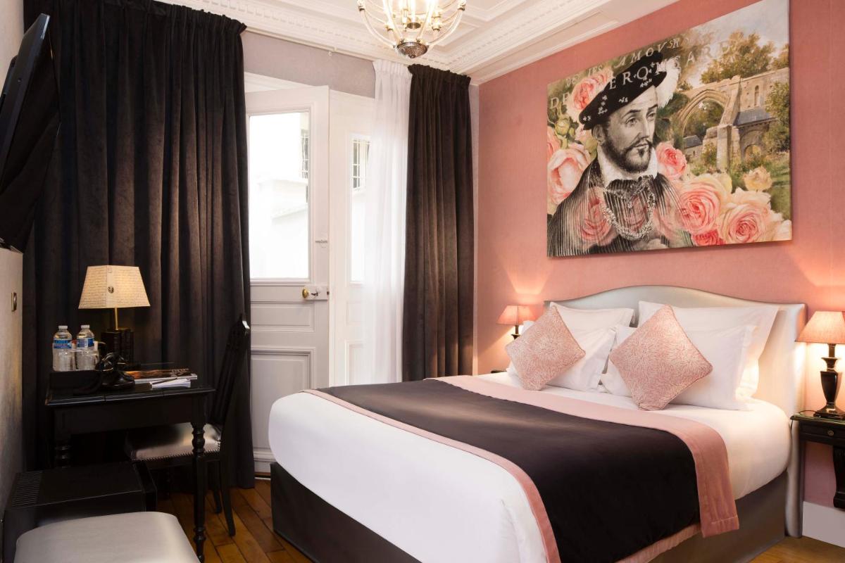 Un ou plusieurs lits dans un hébergement de l'établissement Hotel & Spa de Latour Maubourg