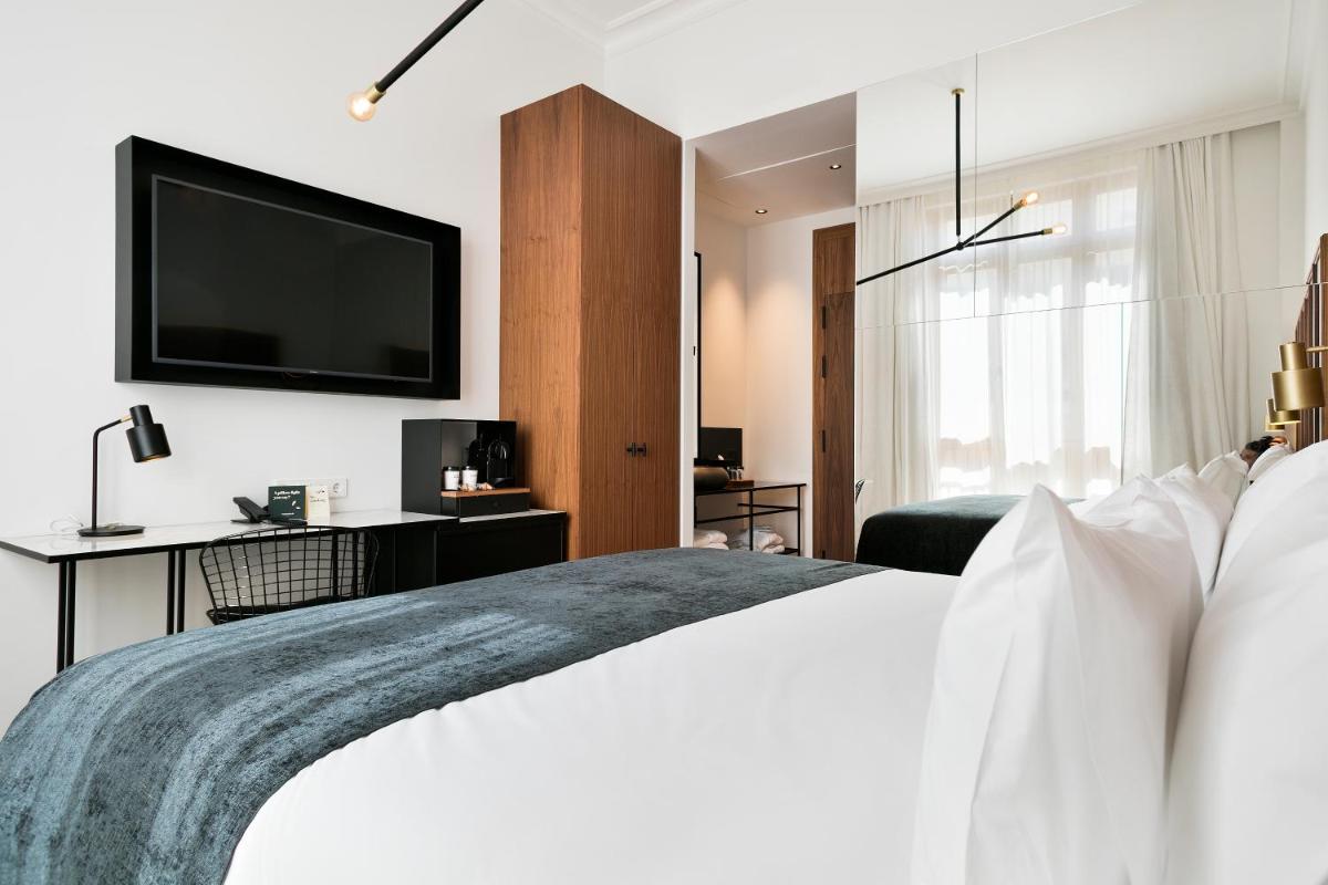 Cama o camas de una habitación en Yurbban Passage Hotel & Spa