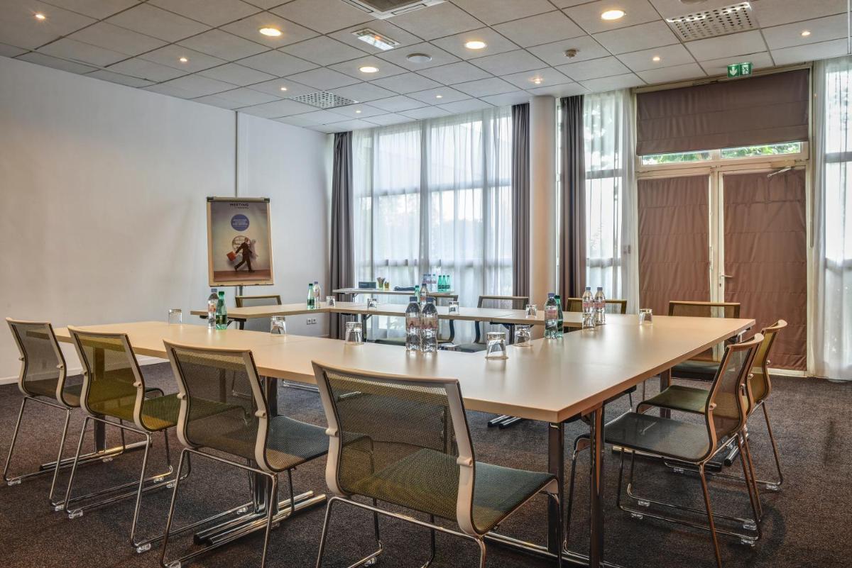 Espace de conférence ou salle de réunion dans l'établissement Novotel Senart Golf De Greenparc