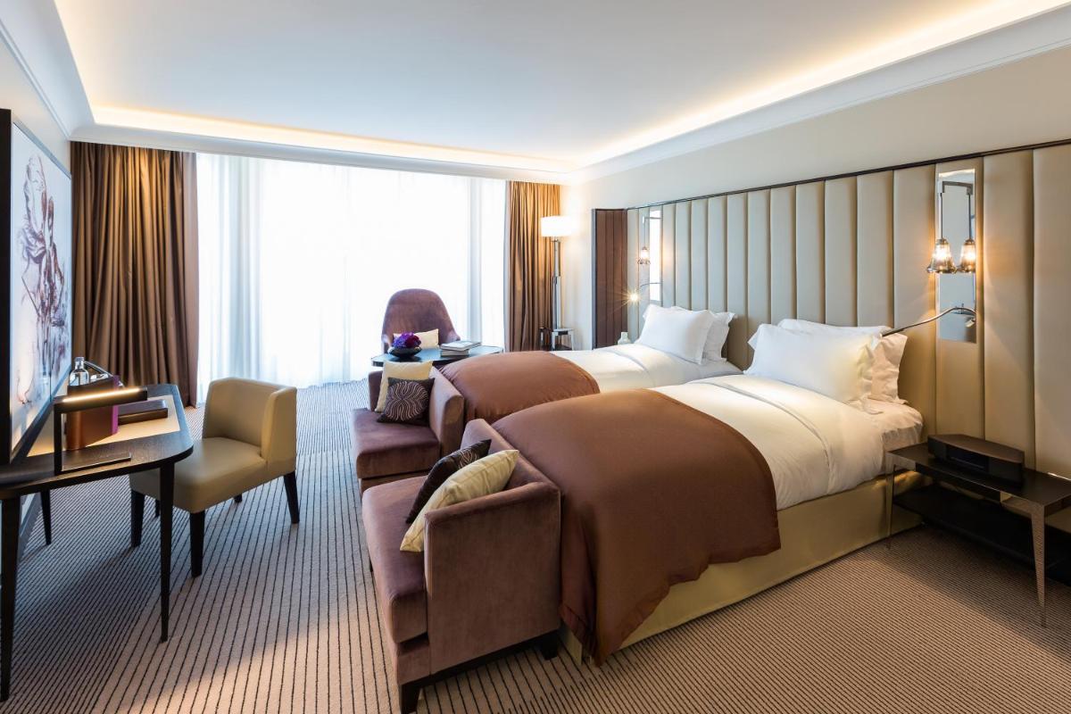 Ein Bett oder Betten in einem Zimmer der Unterkunft Sofitel Frankfurt Opera