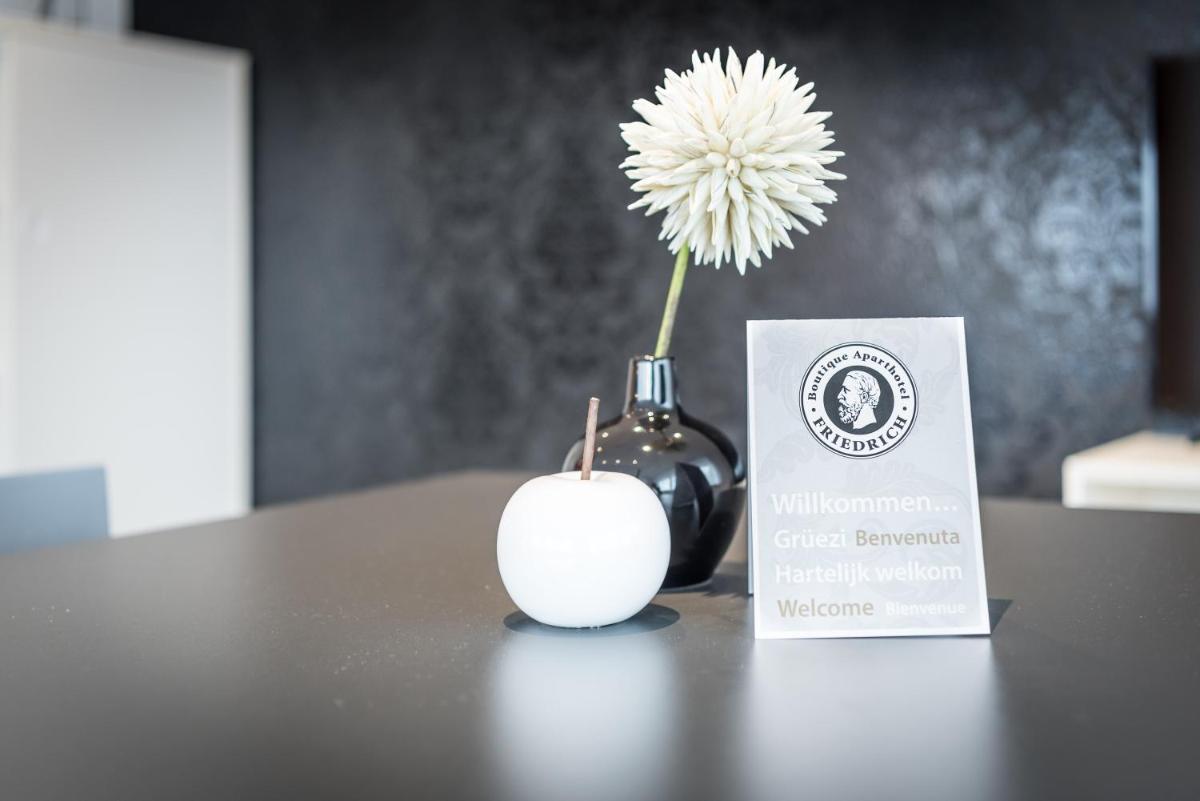 Ein Zertifikat, Auszeichnung, Logo oder anderes Dokument, das in der Unterkunft Friedrich Boutique-Apartments ausgestellt ist