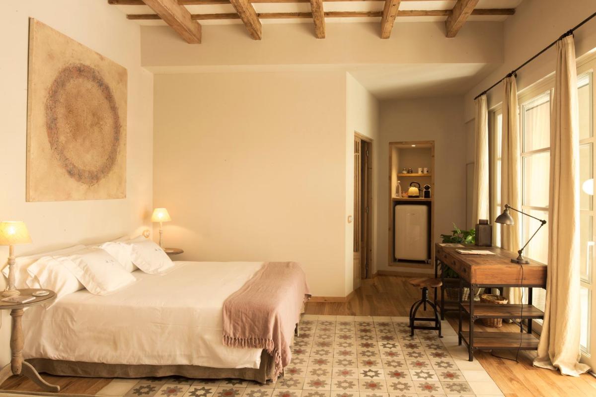 Cama o camas de una habitación en Jardí de Ses Bruixes Boutique Hotel