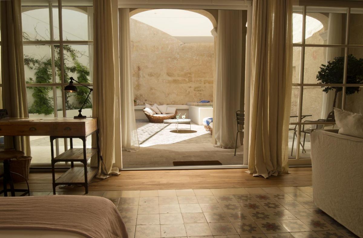 Cama o camas de una habitación en Jardí de Ses Bruixes Boutique Hotel