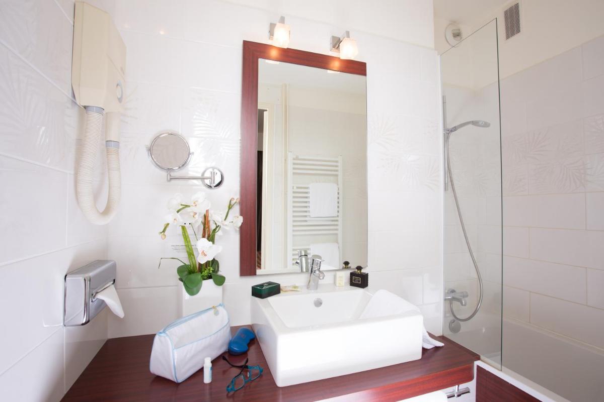 Logis Hotels Grand Hotel d'Orléans et Restaurant Le Goulu - Housity