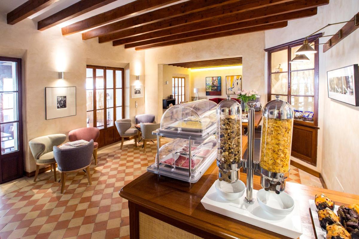 Hotel y Apartamentos DES PUIG - Housity