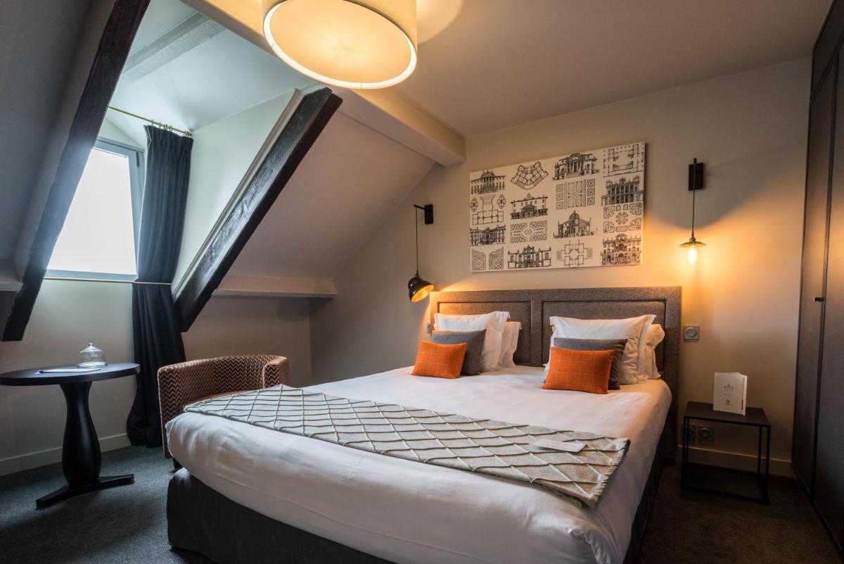 Un ou plusieurs lits dans un hébergement de l'établissement Le Général d'Elbée Hotel & Spa - Teritoria