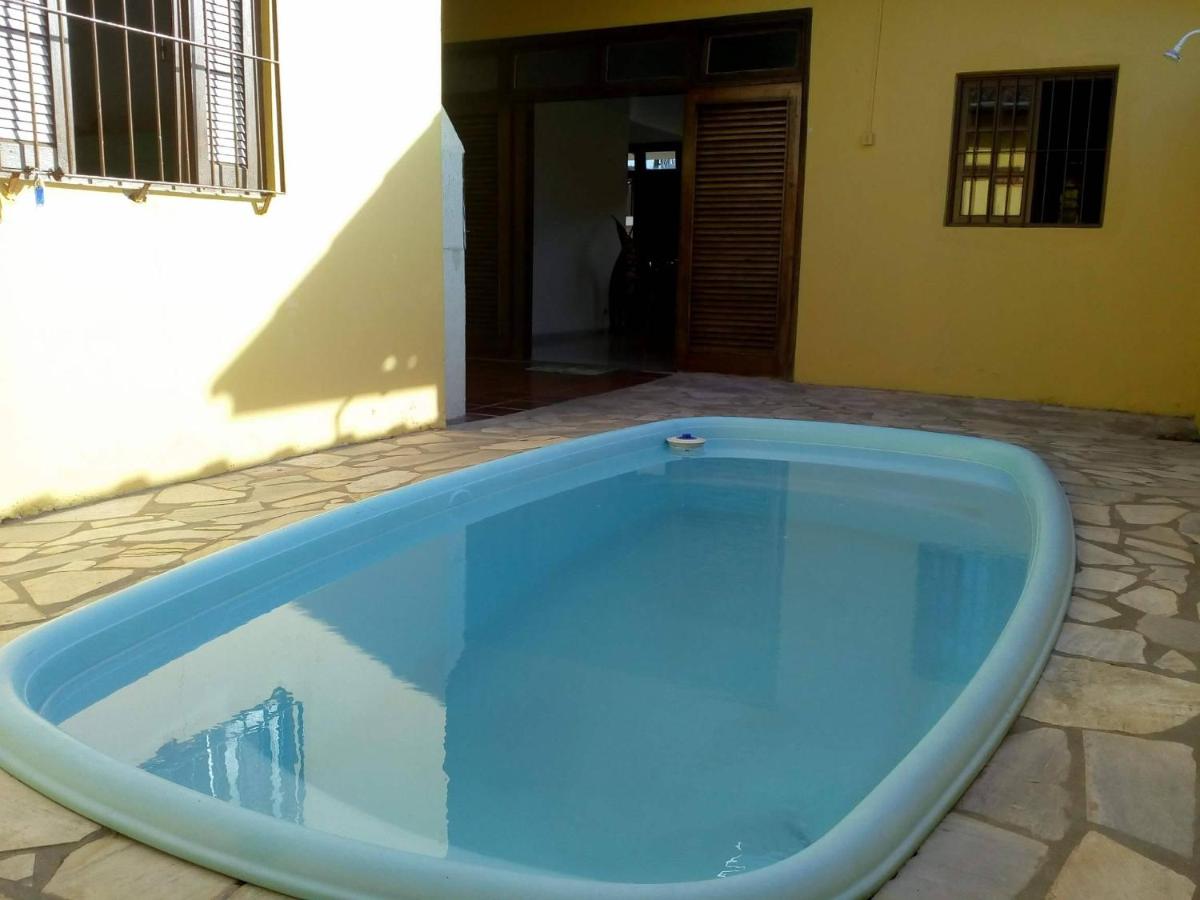 Suitetrails - Casa com piscina na Praia Grande