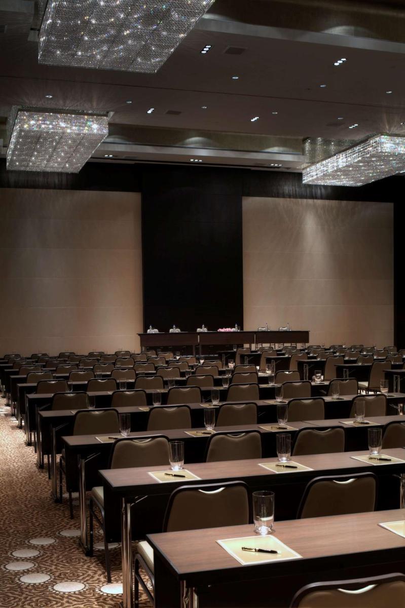 an empty conference room with tables and chairs at Park Hyatt Hotel and Residences, Hyderabad in Hyderabad