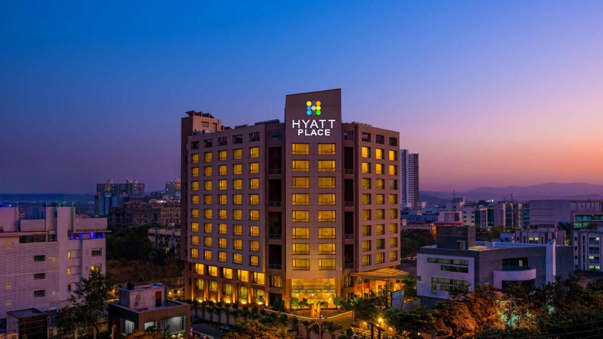 a tall building with a star on top of it at Hyatt Place Pune Hinjawadi in Pune