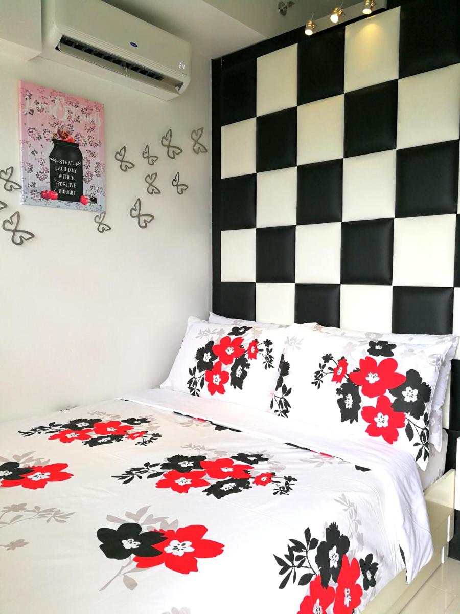 Cozy Condo at Wind Residences - Housity