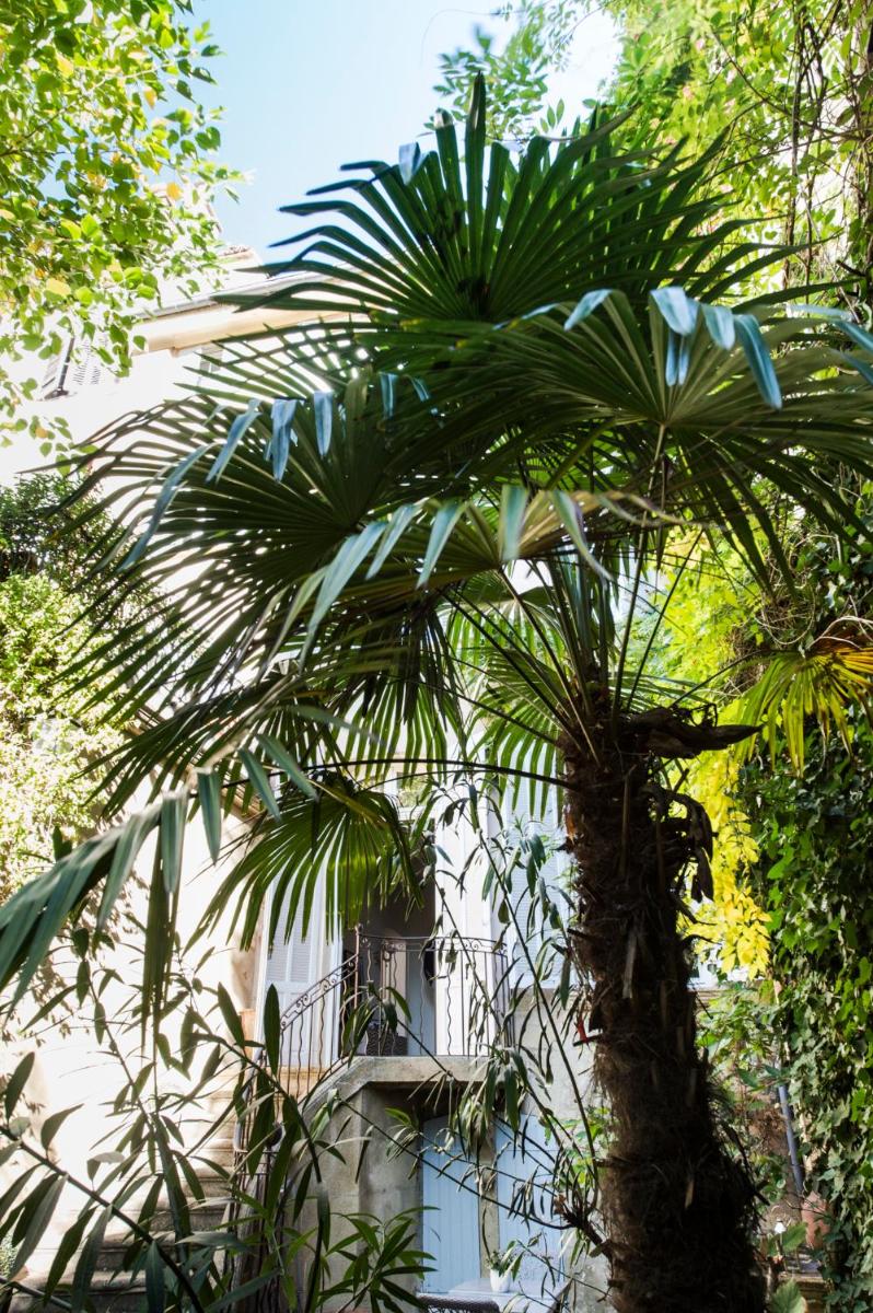 Jardin de l'établissement Hôtel Particulier Le 28 - Spa & Art Luxury Design by Alain Ducasse