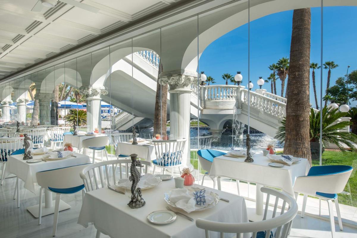 Un restaurante o sitio para comer en Gran Hotel Miramar GL