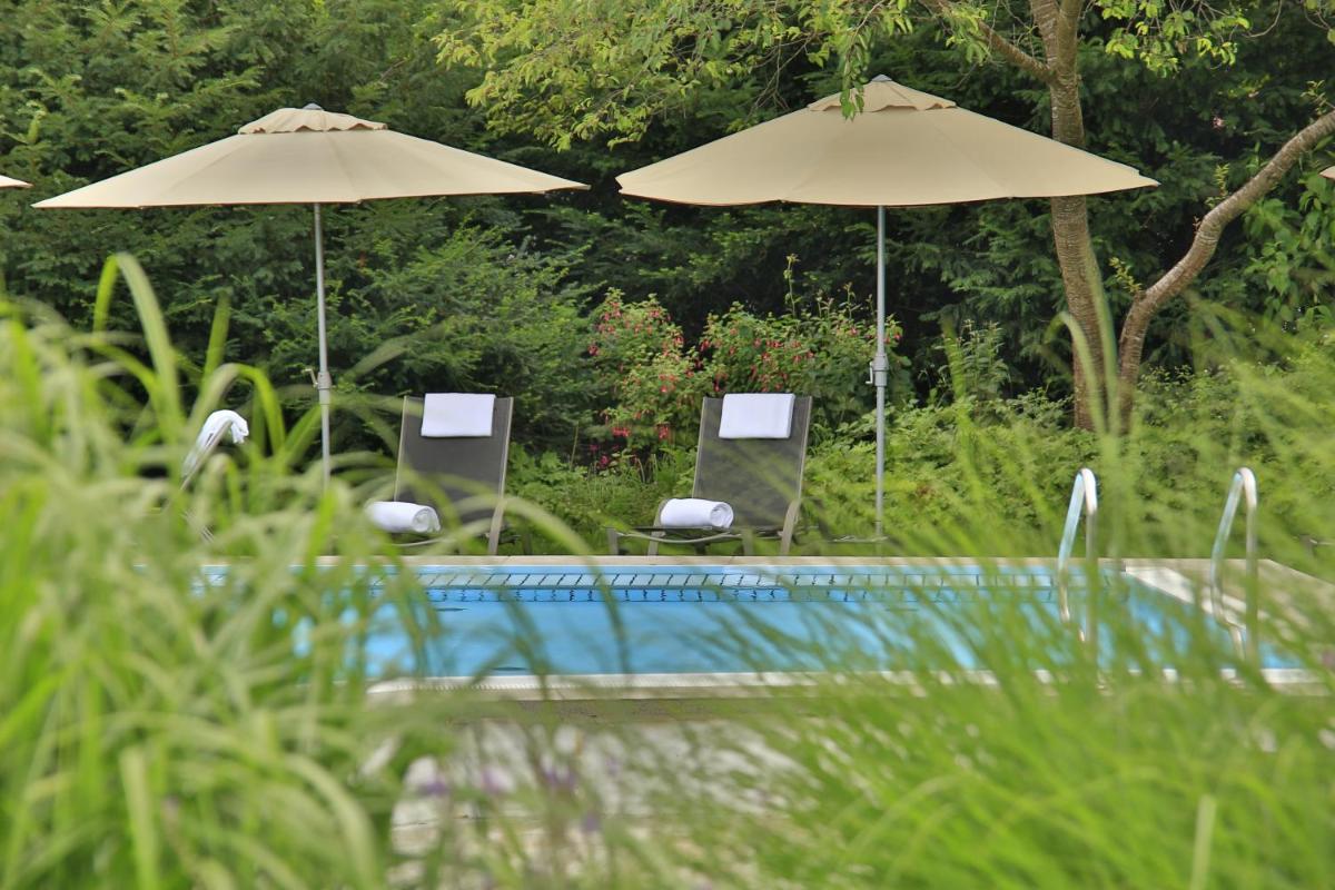 Der Swimmingpool an oder in der Nähe von Alpenhof Murnau