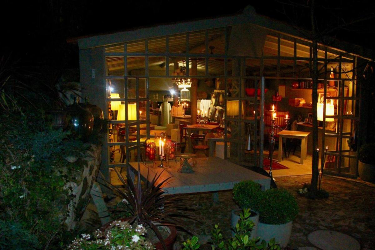 Um restaurante ou outro lugar para comer em Carmo's Boutique Hotel - Small Luxury Hotels of the World