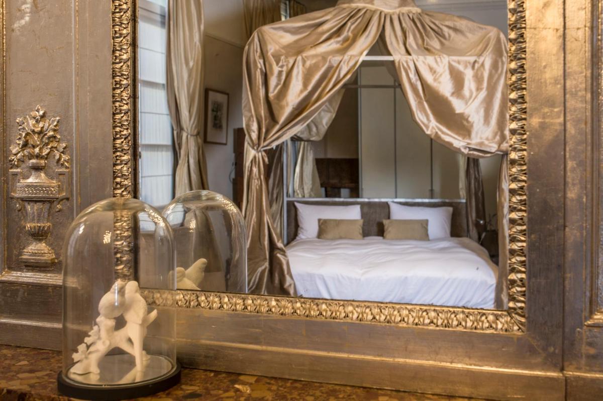 Un ou plusieurs lits dans un hébergement de l'établissement Hôtel Particulier Le 28 - Spa & Art Luxury Design by Alain Ducasse