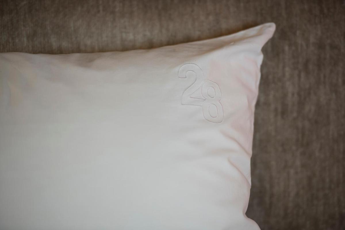 Un ou plusieurs lits dans un hébergement de l'établissement Hôtel Particulier Le 28 - Spa & Art Luxury Design by Alain Ducasse