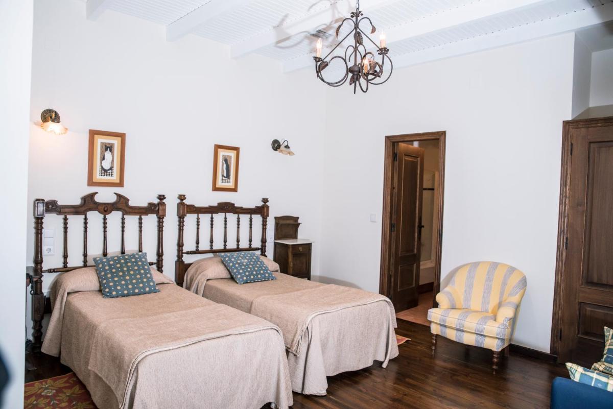 Cama o camas de una habitación en Hotel Monumento Pazo do Castro