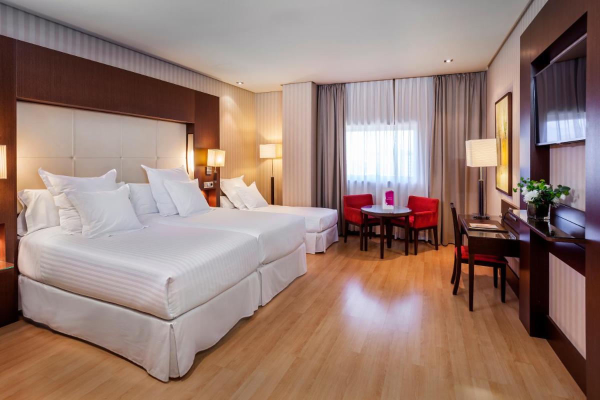 Cama o camas de una habitación en Barceló Granada Congress
